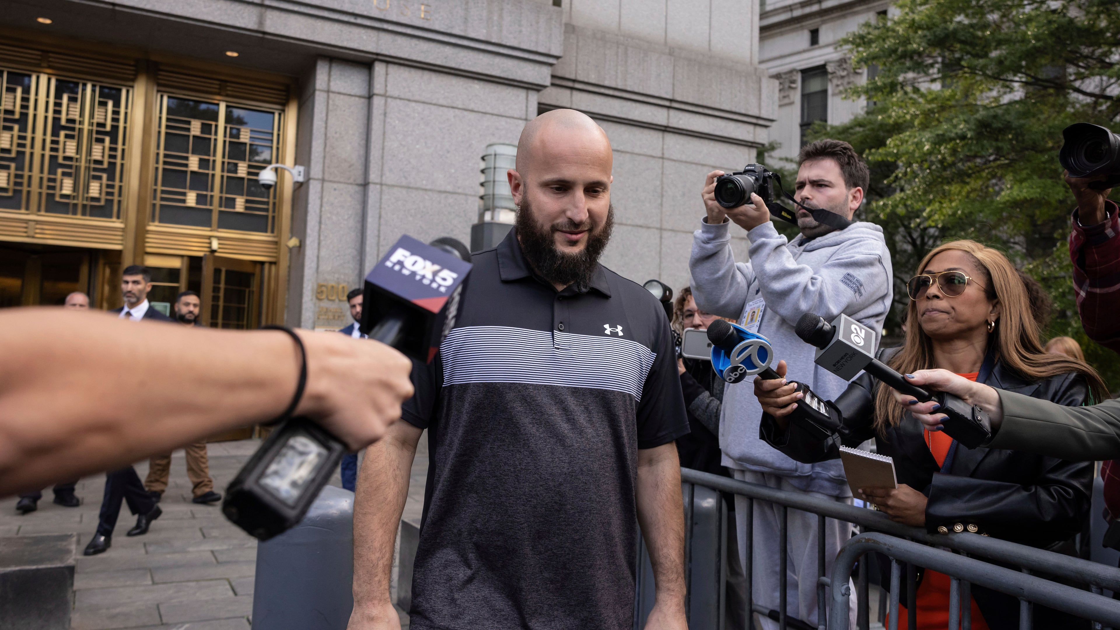 FILE - Mohamed Bahi, New York City Mayor's liaison to the Muslim community, exits Manhattan Federal Court, Oct. 8, 2024, in New York. (AP Photo/Yuki Iwamura, File)