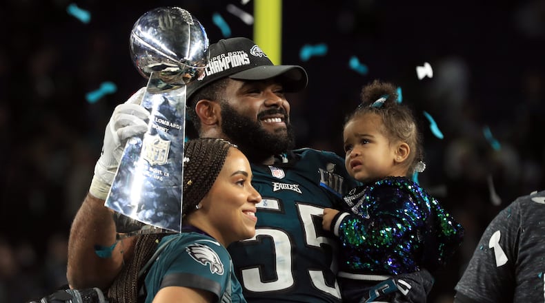 Brandon Graham of the Philadelphia Eagles poses with the Lombardi Trophy after defeating the New England Patriots 41-33 in Super Bowl LII at U.S. Bank Stadium on February 4, 2018 in Minneapolis, Minnesota. (Photo by Mike Ehrmann/Getty Images)