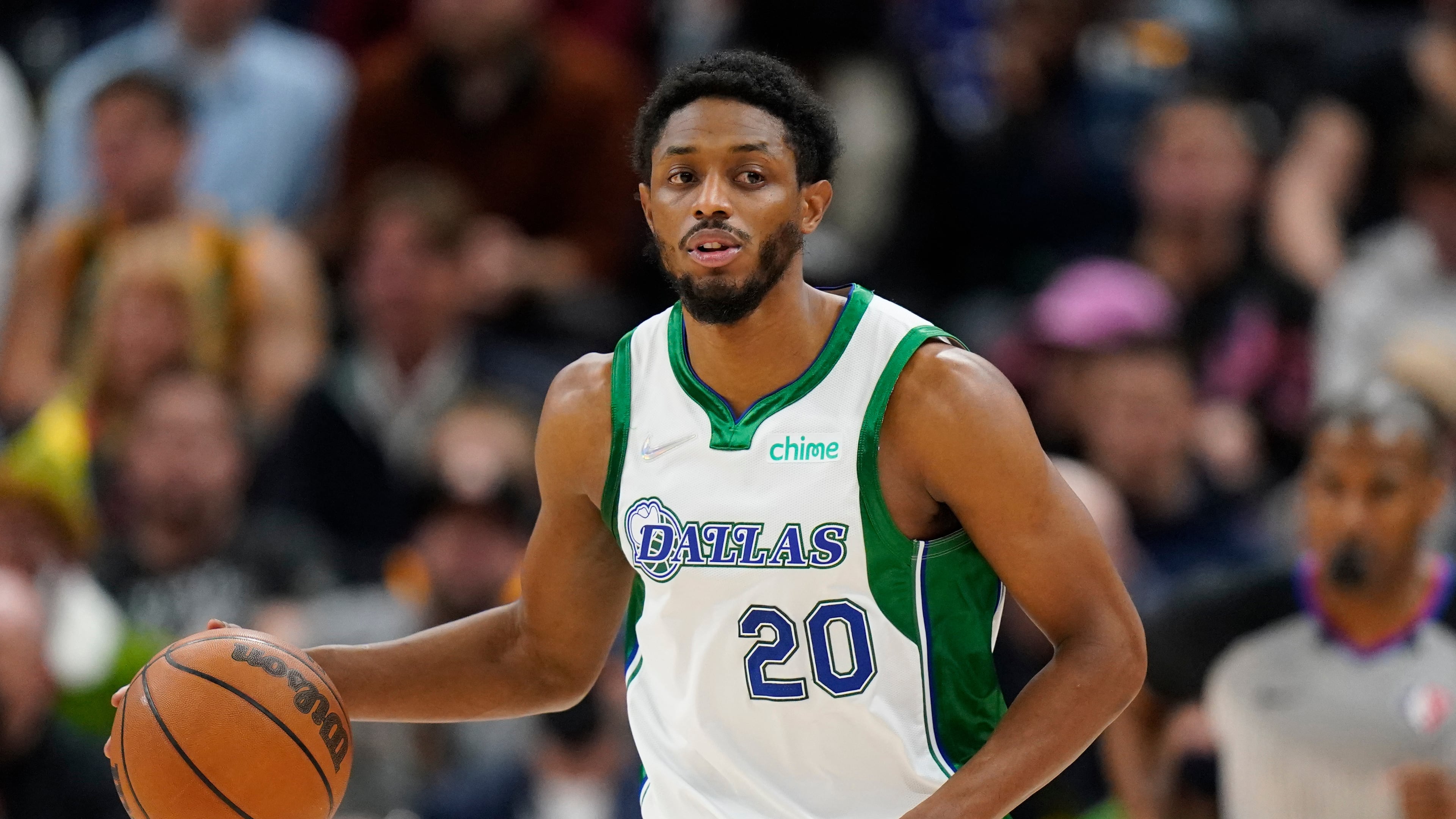 FILE - Dallas Mavericks guard Brandon Knight (20) brings the ball up court in the second half during an NBA basketball game against the Utah Jazz Saturday, Dec. 25, 2021, in Salt Lake City. (AP Photo/Rick Bowmer, File)