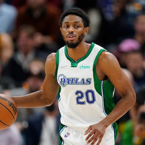 FILE - Dallas Mavericks guard Brandon Knight (20) brings the ball up court in the second half during an NBA basketball game against the Utah Jazz Saturday, Dec. 25, 2021, in Salt Lake City. (AP Photo/Rick Bowmer, File)