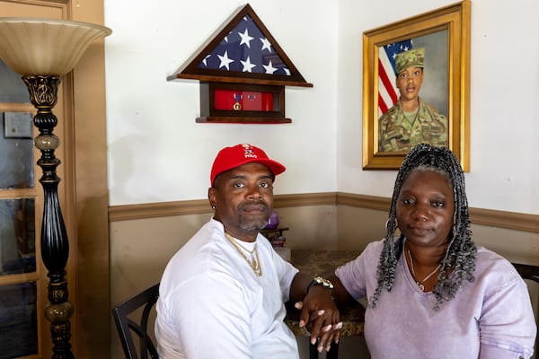 Shawn Sanders and Oneida Oliver-Sanders, parents of Army Reserve Sgt. Kennedy L. Sanders.
