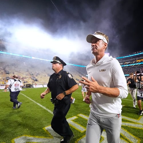 LSU coach Lane Kiffin runs off the field after the Tigers beat Clemson 51-10 on Saturday, Sept. 6, 2026 in Baton Rouge, La. (Gerald Herbert/AP)