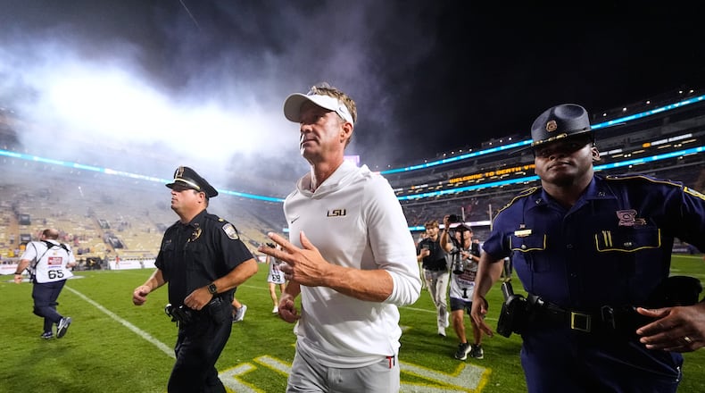 LSU coach Lane Kiffin runs off the field after the Tigers beat Clemson 51-10 on Saturday, Sept. 6, 2026 in Baton Rouge, La. (Gerald Herbert/AP)