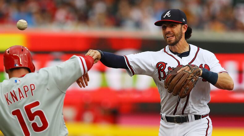 Braves shorststop Dansby Swanson had three hits Friday and likes the never-say-side attitude the team has shown in its first two games to start the season. (Curtis Compton/ccompton@ajc.com)