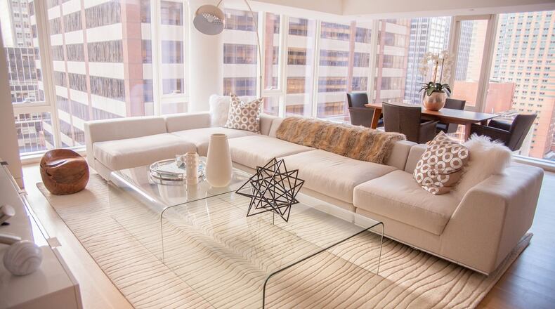 A low profile sofa creates the proper sense of scale in living room with a low ceiling. (Handout/TNS)