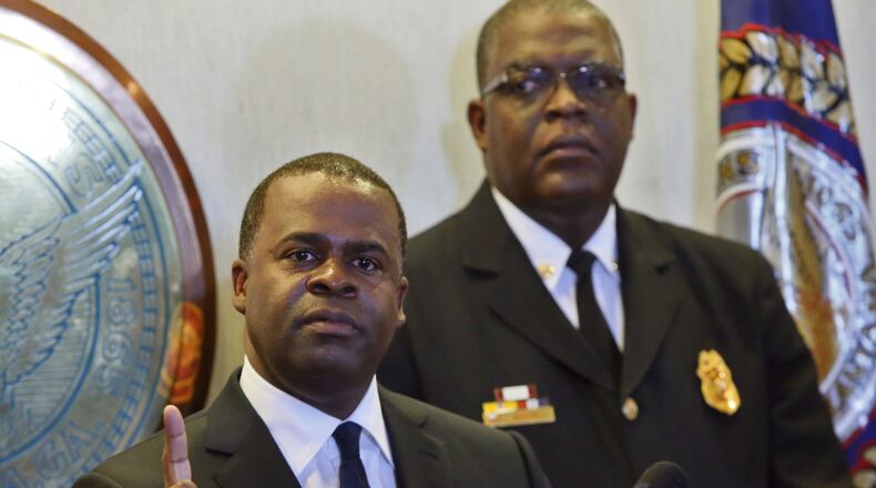 January 6, 2015 - Atlanta - Kasim Reed at times appeared to be angry over fallout over the book, and calls he was getting at his home over the holidays. Atlanta Mayor Kasim Reed announced the termination of embattled Fire Chief Kelvin Cochran today over fallout from his controversial book at a press conference today at City Hall. Cochran's termination follows his month-long suspension, which many in the religious right say is an affront to religious freedom. Immediately following Reed's press conference, Cochran held one of his own, outside the Public Safety Building, where he talked about his faith, having just found out he was fired. BOB ANDRES / BANDRES@AJC.COM Atlanta Mayor Kasim Reed announces the termination of embattled Fire Chief Kelvin Cochran on Tuesday. Bob Andres, bandres@ajc.com