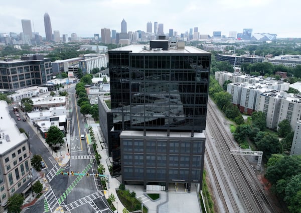 The Atlanta skyline is seen behind the 1050 Brickworks building on Tuesday, July 14, 2026. (Hyosub Shin/AJC)