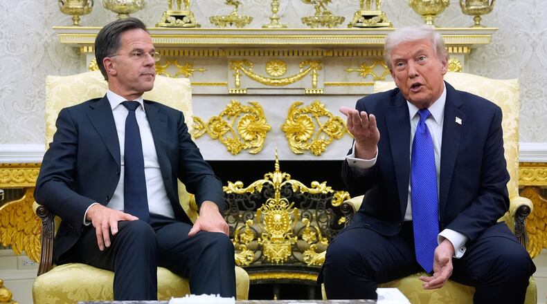 FILE - President Donald Trump meets with NATO Secretary General Mark Rutte in the Oval Office of the White House, Oct. 22, 2025, in Washington. (AP Photo/Alex Brandon, File)