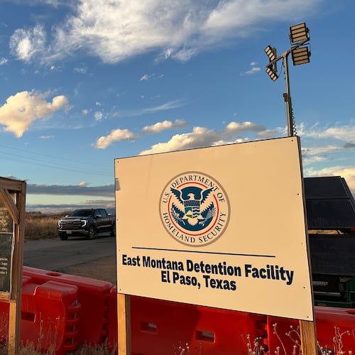 FILE - A sign marks the entrance to a series of hardened tents at the Camp East Montana immigrant detention center in the desert at a U.S. Army base on the outskirts of El Paso, Texas, Feb. 13, 2026. (AP Photo/Morgan Lee, File)