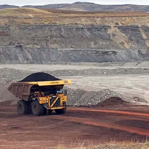 FILE - A dump truck hauls coal at the Eagle Butte Mine, now owned by Eagle Specialty Materials, LLC, near Gillette, Wyo., March 28, 2017. (AP Photo/Mead Gruver, File)