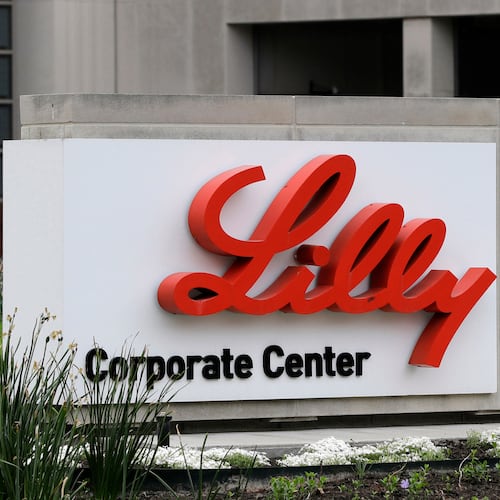 FILE - A sign for Eli Lilly & Co. stands outside their corporate headquarters in Indianapolis on April 26, 2017. (AP Photo/Darron Cummings, File)