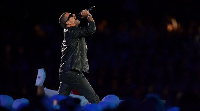 George Michael performs during the Closing Ceremony on Day 16 of the London 2012 Olympic Games at Olympic Stadium on August 12, 2012 in London, England. (Photo by Jeff J Mitchell/Getty Images)