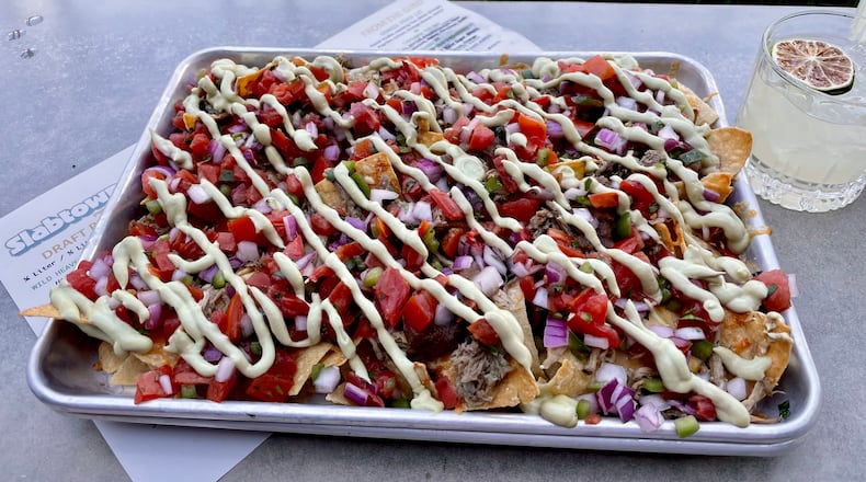 Chef Kevin Gillespie’s sheet tray nachos at Slabtown Public House.
Angela Hansberger for The Atlanta Journal-Constitution
