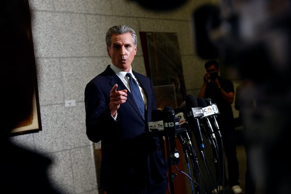 Gov. Gavin Newsom speaks after U.S. District Judge Charles Breyer granted an emergency temporary restraining to stop President Trump's deployment of the California National Guard, Thursday, June 12, 2025, at the California State Supreme Court building in San Francisco. (Santiago Mejia/San Francisco Chronicle via AP)