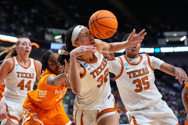 Texas guard Ndjakalenga Mwenentanda (32) chases down a loose ball during the first half against Tennessee in the Sweet 16 of the NCAA college basketball tournament, Saturday, March 29, 2025. in Birmingham, Ala. (AP Photo/Gerald Herbert)