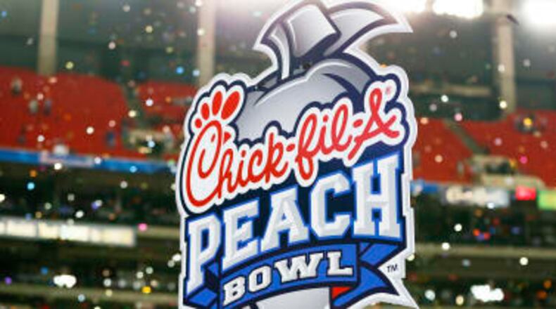 The Chick-fil-A Peach Bowl between No. 7 Auburn and No. 12 UCF will kick off on Jan. 1 at 12:30 ET. It can be viewed on ESPN. (Kevin C. Cox/ GettyImages)
