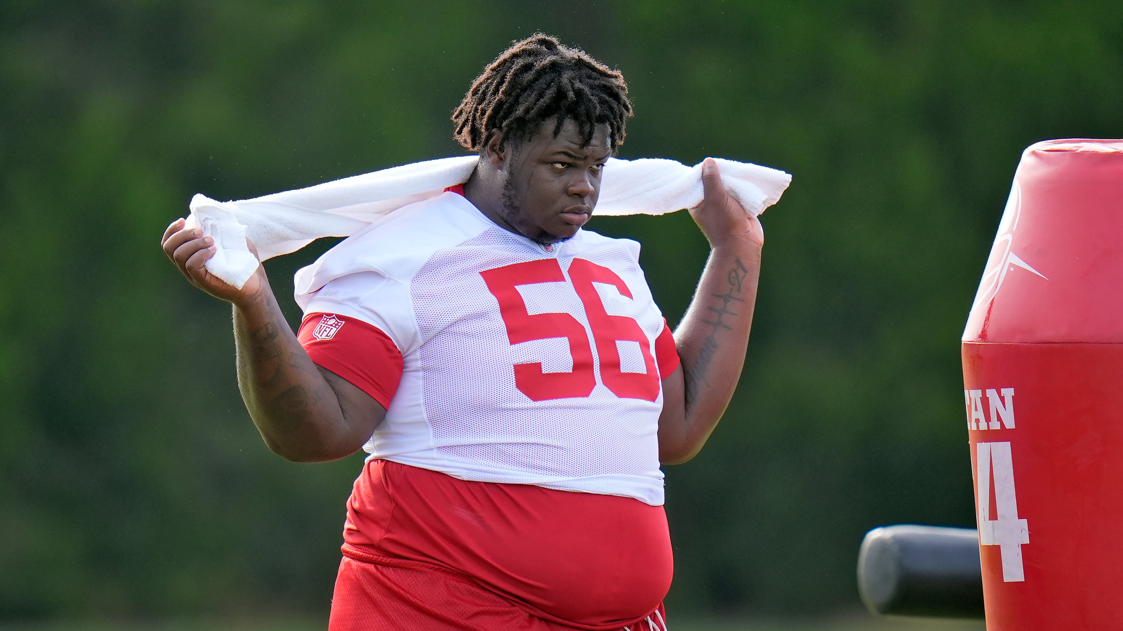 FILE - Tampa Bay Buccaneers defensive tackle Desmond Watson watches from the sideline during practice at NFL football training camp, Wednesday, July 23, 2025, in Tampa, Fla. (AP Photo/Chris O'Meara, File)