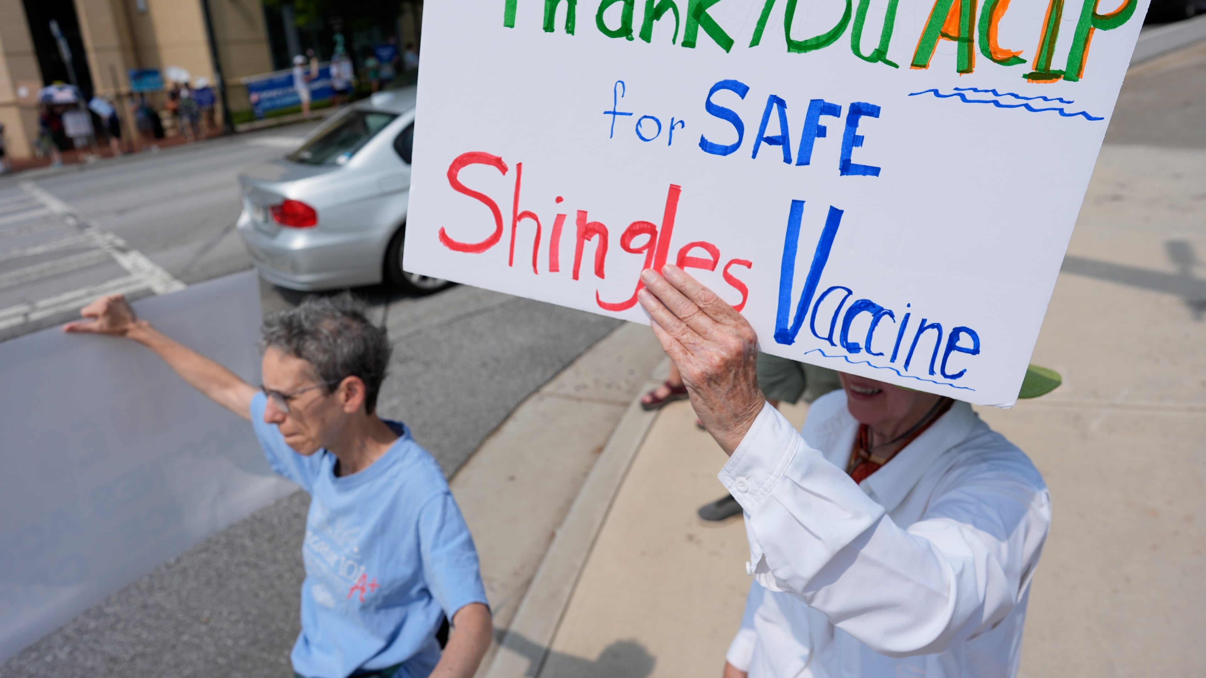 FILE - Demonstrators rally for support of the CDC during a meeting of the Advisory Committee in Immunization Practices, June 25, 2025, in Atlanta. (AP Photo/Mike Stewart, File)