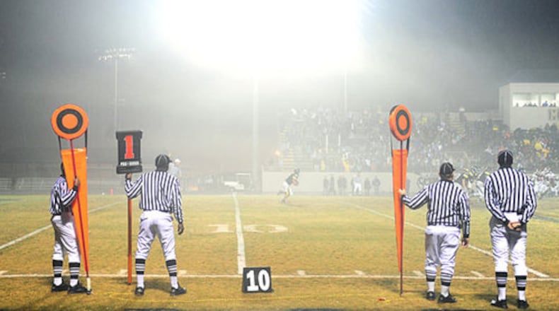 When you combine the Georgia-Florida football game with Halloween, you get a shortage of referees for Friday night high school football games. (File/AJC 2020)