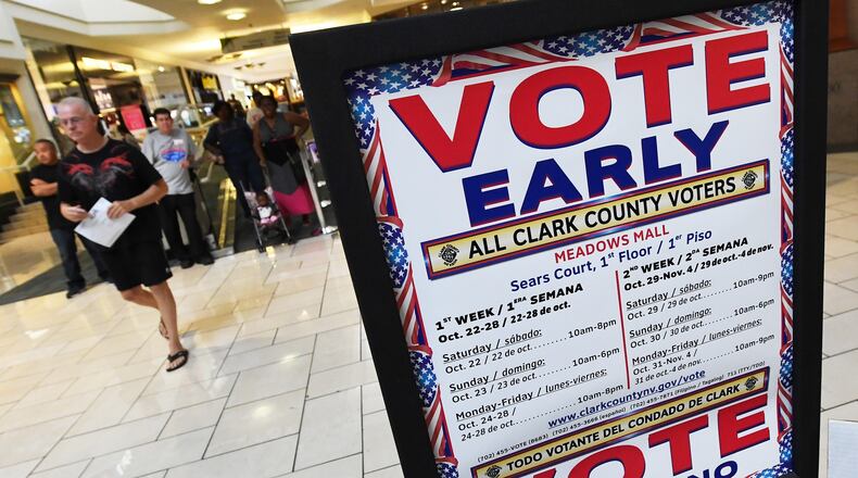 LAS VEGAS, NV - OCTOBER 26: People wait to vote early at the Meadows Mall on October 26, 2016 in Las Vegas, Nevada. Voters in Clark County are voting early at a record pace this year ahead of the November 8 general election. (Photo by Ethan Miller/Getty Images)