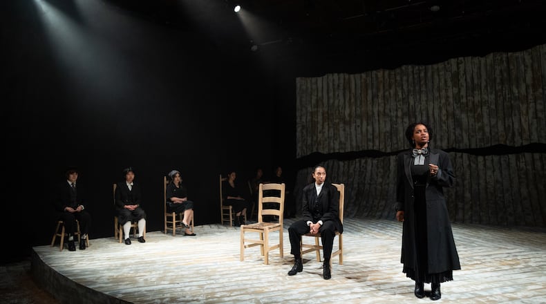 A mother (Dionna D. Davis, right) lectures her son (Ashley Alves, center) about the dangers of violence in Theatre Emory's "Blood Wedding."
