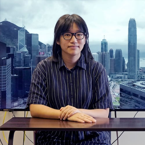 FILE - Chow Hang-tung, vice chairperson of the Hong Kong Alliance in Support of the Democratic Patriotic Movements of China, poses after an interview in Hong Kong on May 24, 2021. (AP Photo/Vincent Yu, File)
