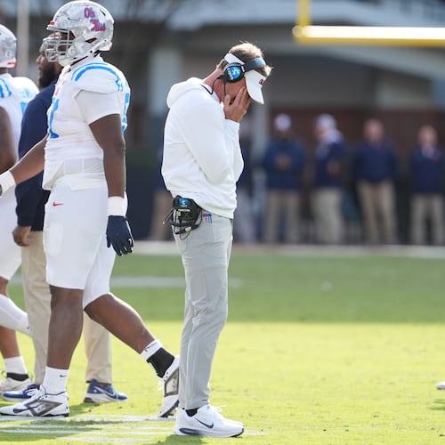 Mississippi head coach Lane Kiffin hangs his head as his players leave the field during their game against Mississippi State on Friday, Nov. 28, 2025, in Starkville, Miss. Kiffin took over the Ole Miss program before the 2020 season. (Rogelio V. Solis/AP)