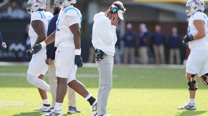Mississippi head coach Lane Kiffin hangs his head as his players leave the field during their game against Mississippi State on Friday, Nov. 28, 2025, in Starkville, Miss. Kiffin took over the Ole Miss program before the 2020 season. (Rogelio V. Solis/AP)