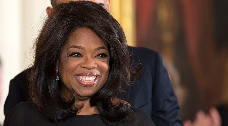 Media mogul Oprah Winfrey is seen here receiving the Presidential Medal of Freedom from President Barack Obama in the East Room of the White House on November 20, 2013 in Washington. Oprah was the commencement speaker at Agnes Scott College in metro Atlanta over the weekend, inspiring the women graduates with encouraging stories and words of wisdom.