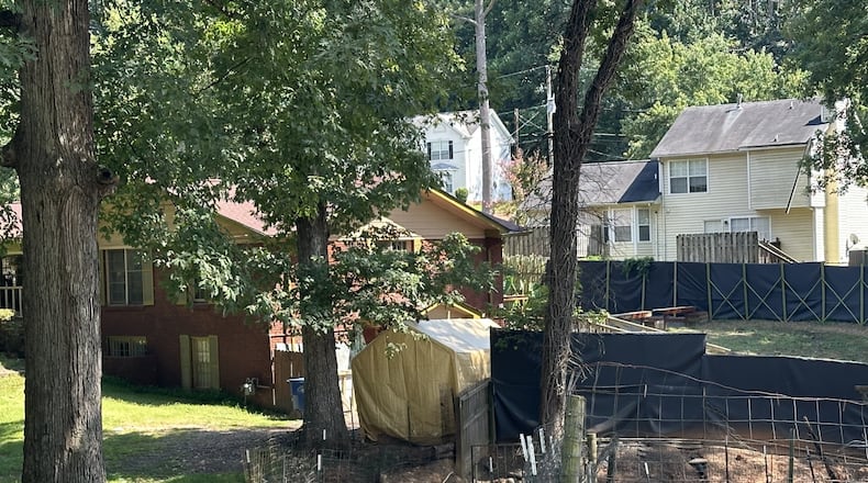 A goat roams free in a southwest Atlanta neighborhood where some residents want the city to take action on a property that has been advertised as a cultural event space.