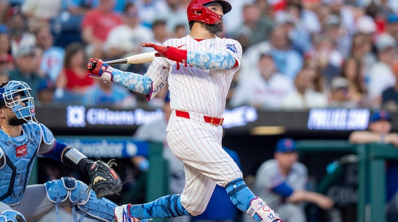Philadelphia Phillies' Kyle Schwarber, right, hits a three-run home run during the second inning of a baseball game against the New York Mets, Sunday, June 21, 2026, in Philadelphia. (AP Photo/Chris Szagola)