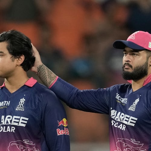 Rajasthan Royals' captain Riyan Parag consoles his teammate Vaibhav Sooryavanshi after Gujarat Titans won against Rajasthan Royals during the Indian Premier League cricket match in New Chandigarh, India, Friday, May 29, 2026. (AP Photo/Ashwini Bhatia)