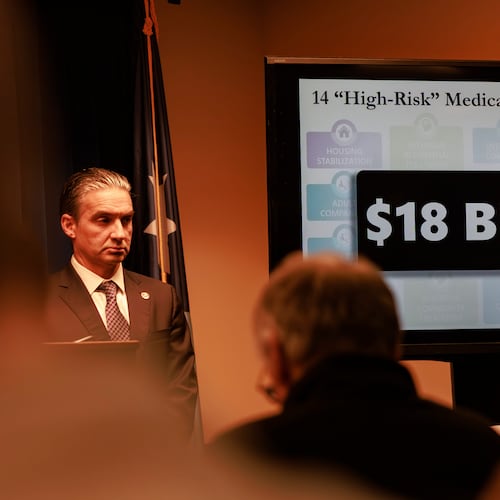 A sign is shown as first Assistant U.S. Attorney Joseph H. Thompson, not seen, delivers remarks during a news conference at the U.S. Attorney's Office inside the United States Courthouse on Thursday, Dec. 18, 2025, in Minneapolis. (Kerem Yücel/Minnesota Public Radio via AP)