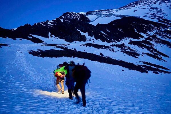 In this image provided by the Alpine Rescue Team, Alpine Rescue Team members take part in helping get two men struck by lightning off Torreys Peak in Colorado, Thursday, June 12, 2025. (Jake Smith/Alpine Rescue Team via AP)