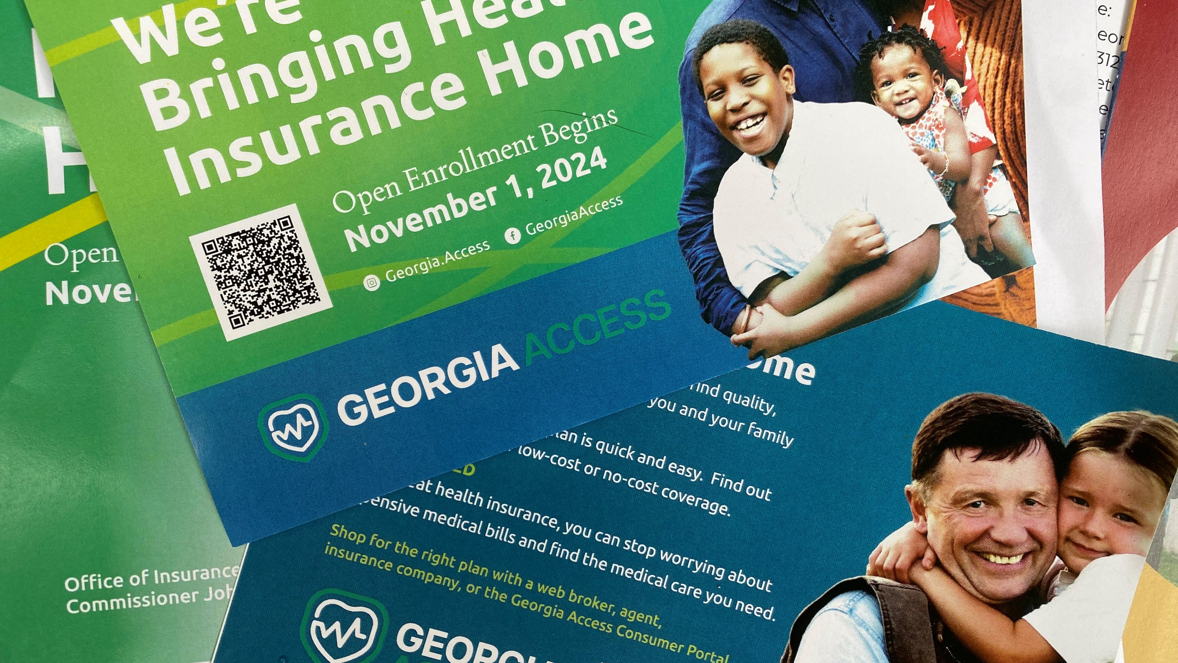 Promotional materials for GeorgiaAccess.gov distributed at a Georgia Access launch event Friday, Nov. 1, 2024, near the Georgia Capitol. Georgia Access is the state-based exchange marketplace for the Affordable Care Act in Georgia. (Ariel Hart/AJC)