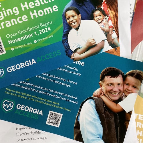 Promotional materials for GeorgiaAccess.gov distributed at a Georgia Access launch event Friday, Nov. 1, 2024, near the Georgia Capitol.  Georgia Access is the state-based exchange marketplace for the Affordable Care Act in Georgia. (Ariel Hart/AJC)
