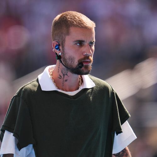 Justin Bieber leaves the pitch after performing at halftime during the World Cup final soccer match between Spain and Argentina in East Rutherford, N.J., near New York, Sunday, July 19, 2026. (AP Photo/Abbie Parr)