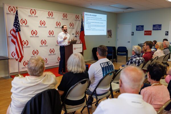 Johnny Moseley, Georgia director for election integrity for the RNC, leads a voter integrity training workshop in Cumming in July. (Arvin Temkar / arvin.temkar@ajc.com)