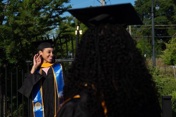 Morehouse School of Medicine student Sadelle Smith poses for a photo before walking to her graduation ceremony Saturday, May 16, 2026, in Atlanta. (Ben Gray for the AJC)