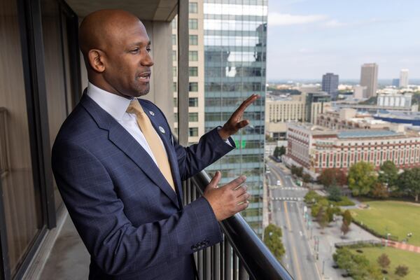 Ramon Reyes looks over downtown Atlanta from the Omni Hotel. He started out as a doorman and worked his way up to becoming the general manager at the Omni Atlanta Hotel. PHIL SKINNER FOR THE ATLANTA JOURNAL-CONSTITUTION