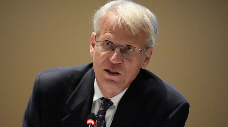 FILE - Dr. Martin Kulldorf speaks during a meeting of the Advisory Committee in Immunization Practices at the CDC, June 25, 2025, in Atlanta. (AP Photo/Mike Stewart, File)