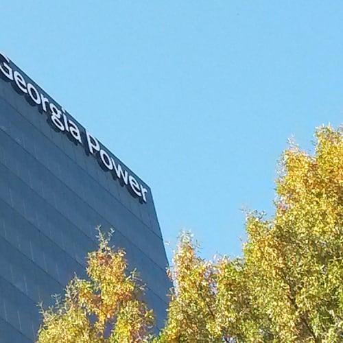 Atlanta-based Georgia Power, a unit of Southern Company, has agreed on a way to let large companies add their own clean energy to the power grid. (Matt Kempner/AJC)