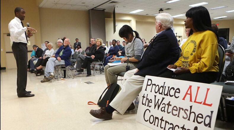 Interim DeKalb County CEO Lee May addressed residents demanding answers about excessively high water bills during a town hall meeting at the Maloof Auditorium in Decatur on Nov. 10. Curtis Compton/ccompton@ajc.com