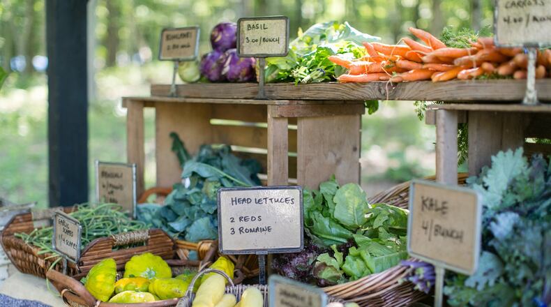 Shoppers know to come early to choose from the widest variety of produce when they shop at the Serenbe Farmers Market. CONTRIBUTED BY J. ASHLEY PHOTOGRAPHY