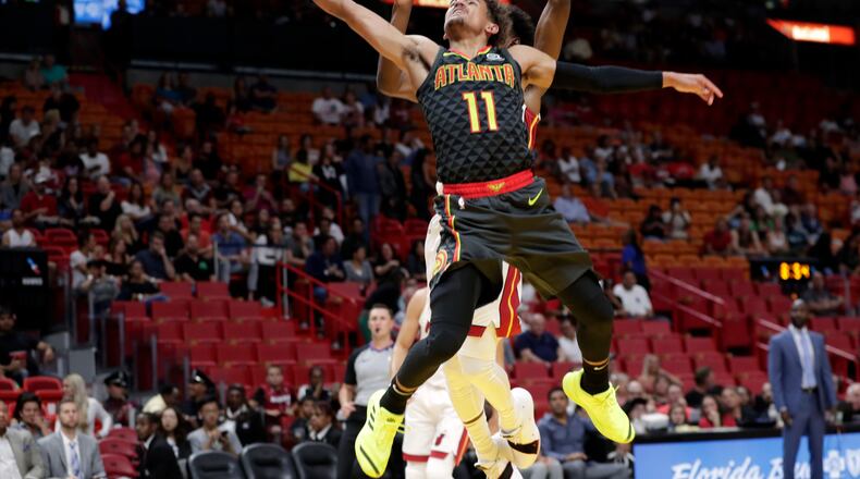 The Hawks' Trae Young scored 11 Friday night. (AP Photo/Lynne Sladky)