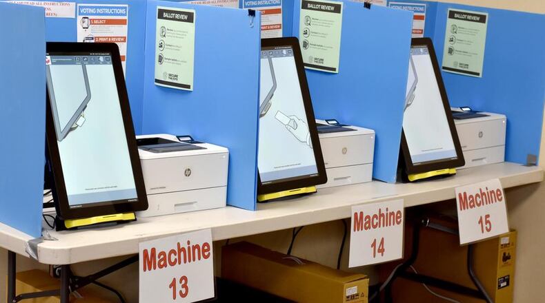 Voting machines (electronic) with blue dividers between each