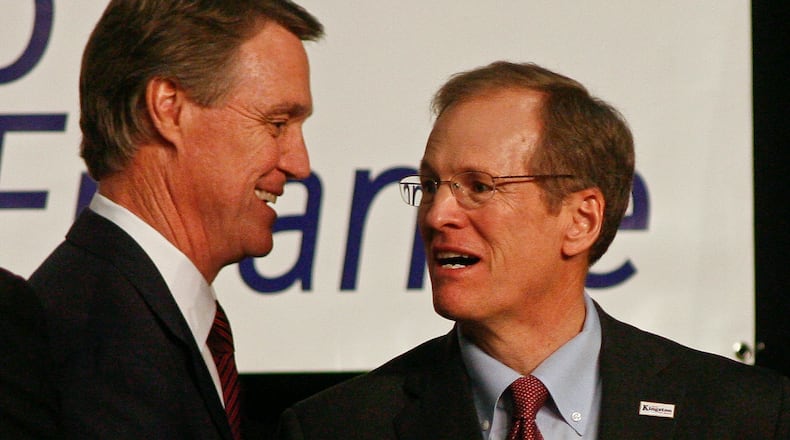Georgia Ports Authority board member David Perdue speaks with U.S. Rep. Jack Kingston (R-Savannah) after a debate Saturday, Jan. 18, 2014, at the Cook County High School Performing Arts Center in Adel, Ga. The Georgia Republican Party is holding six more debates around the state for the eight GOP candidates competing to replace U. S. Sen. Saxby Chambliss, who is retiring at the end of the year. (AP Photo/Phil Sears) Republicans David Perdue and Jack Kingston in 2014, when they were both vying for Georgia's open U.S. Senate seat.