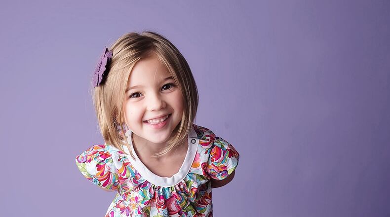 Atlanta’s Emerald August creates timeless children’s clothing in modern colors and prints, like this flutter sleeve tunic top and Lulu leggings. CONTRIBUTED BY HELMUTH PHOTOGRAPHY