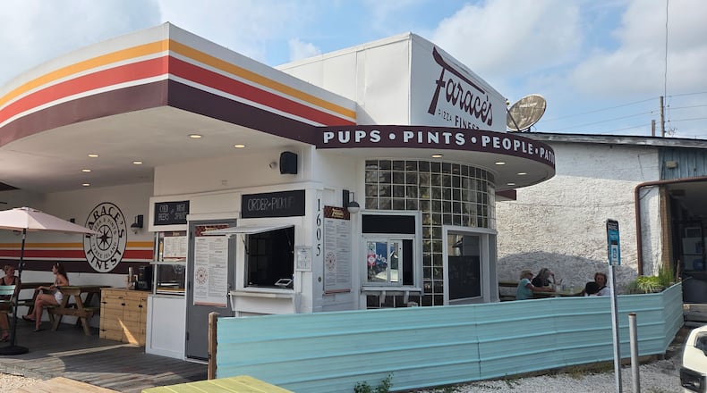 The exterior of a retro pizza joint called Farace's in Savannah GA.