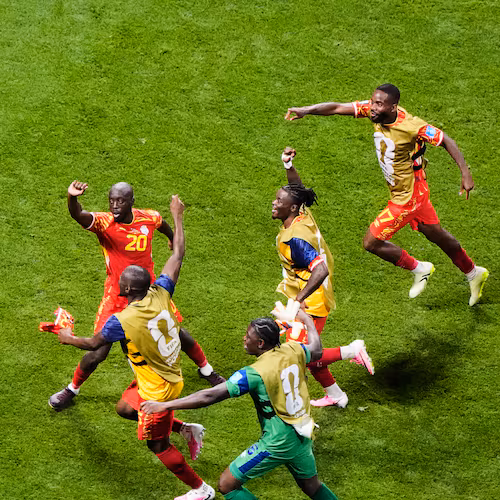 Congo's Yoane Wissa (20) celebrates with teammates after scoring their third goal during the World Cup Group K soccer match between DR Congo and Uzbekistan in Atlanta, Saturday, June 27, 2026. (AP Photo/Mike Stewart)